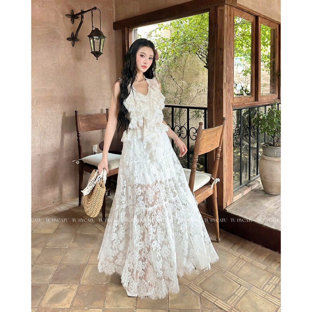 TUBYCATU | Áo chấm bi Nany ruffled top cream